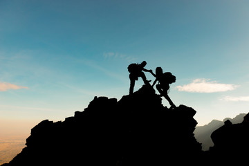 people with peak challenge, help and interest in mountaineering