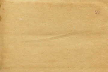 Vintage and old looking paper background. Retro cardboard texture. Grunge paper for drawing. Ancient book page.