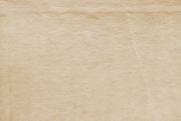 Vintage and old looking paper background. Retro cardboard texture. Grunge paper for drawing. Ancient book page.