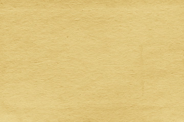 Vintage and old looking paper background. Retro cardboard texture. Grunge paper for drawing. Ancient book page.