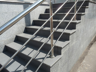 Modern staircase with metal railings
