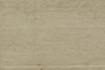Vintage and old looking paper background. Retro cardboard texture. Grunge paper for drawing. Ancient book page.