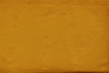 Vintage and old looking paper background. Retro cardboard texture. Grunge paper for drawing. Ancient book page.