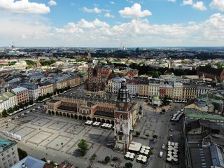 Aerial photo from drone. The culture and historical capital of Poland. Comfortable and beautiful Krakow. The land of Legend. Old part of town,Main square, St. Mary's Basilica.