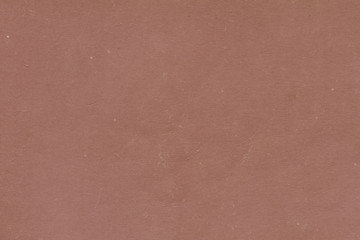 Vintage and old looking paper background. Retro cardboard texture. Grunge paper for drawing. Ancient book page.