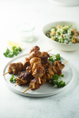 Homemade chicken skewers with fresh parsley