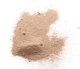 Milled chocolate powder isolated on white background