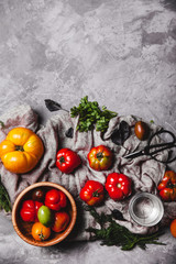 Fresh cherry tomatoes on wooden background