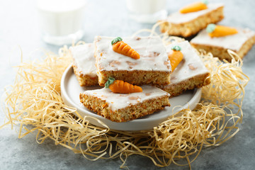 Homemade carrot cake with marzipan and sugar glaze