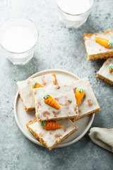 Homemade carrot cake with marzipan and sugar glaze