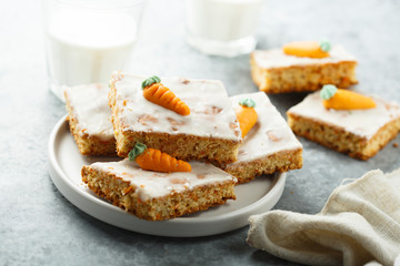 Homemade carrot cake with marzipan and sugar glaze