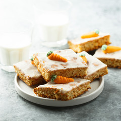Homemade carrot cake with marzipan and sugar glaze