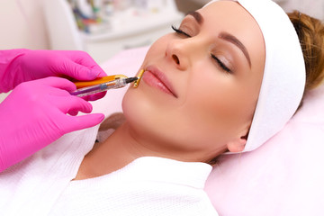 Rejuvenating facial injections.