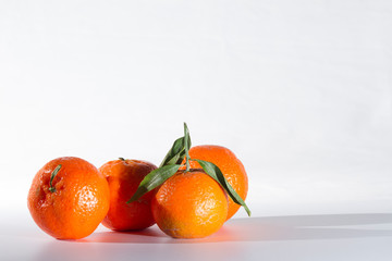 still life: fruit some mandarins in light background