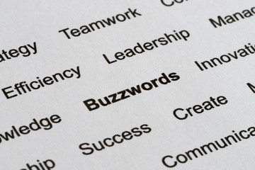 Obraz premium Business Management Buzzwords in Printed Paper