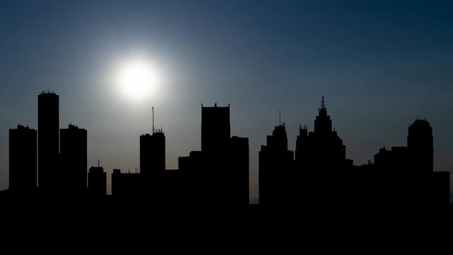Detroit Skyline at Sunset, Time lapse with Colorful Sky and Skyscrapers in Silhouette, Michigan, USA
