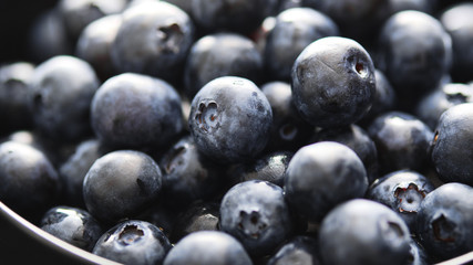 Close-up of ripe and juicy fresh picked blueberries.