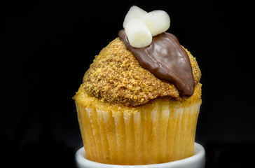 cupcake with chocolate icing and mini marshmallows 