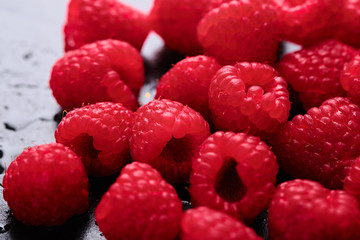 Close-up of delicious fresh and sweet red raspberries.