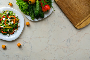 salad with fitaki, tomato, cucember and sweet pepper	