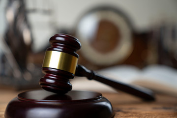 The law concept background. Mallet of the judge and legal code © zolnierek