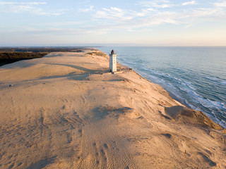 Aerial Drone View of Rubjerg Knude Lighthouse in Denmark - obrazy, fototapety, plakaty