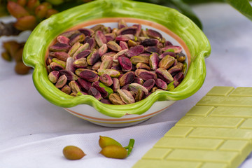 Sweet, delicate, fragrant nuts, Bronte pistachios with  brilliant green colour and handmade pistachio chocolate