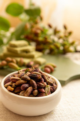 Sweet, delicate and fragrant nuts, Bronte pistachios with  brilliant green colour, ingredient for Italian cuisine, ice creams, cakes, pesto