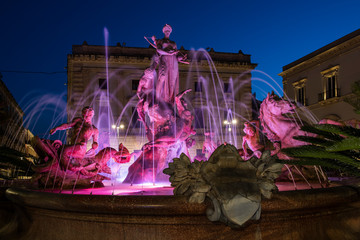 Close-up of the fountain of Diana, Archimedes square in downtown of Ortigia, Syracuse, Sicily...