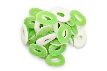 Green gummy candies rings isolated on white. Top view. Jelly  sweets.