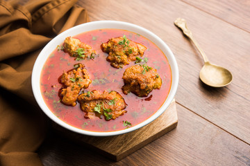Lauki Kofta Curry made using Bottel Gourd or Doodhi, served in a bowl or karahi. selective focus