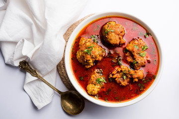 Lauki Kofta Curry made using Bottel Gourd or Doodhi, served in a bowl or karahi. selective focus