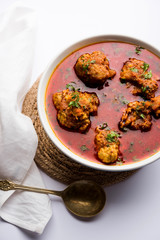 Lauki Kofta Curry made using Bottel Gourd or Doodhi, served in a bowl or karahi. selective focus