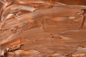 Chocolate cream background. Space for text or design.