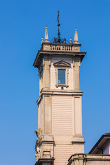 Fototapeta na wymiar Milan, Italy - Apr 17, 2019: Small tower on top of ancient building