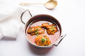 Lauki Kofta Curry made using Bottel Gourd or Doodhi, served in a bowl or karahi. selective focus