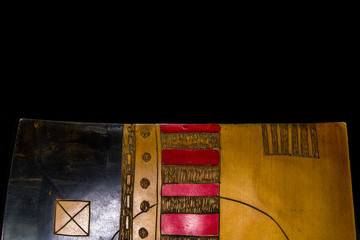 still life: objects, colored and inlaid African ethnic tray