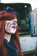 Young woman wearing steampunk style clothes