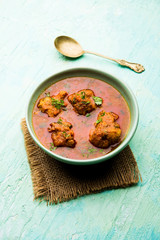 Lauki Kofta Curry made using Bottel Gourd or Doodhi, served in a bowl or karahi. selective focus