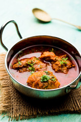 Lauki Kofta Curry made using Bottel Gourd or Doodhi, served in a bowl or karahi. selective focus