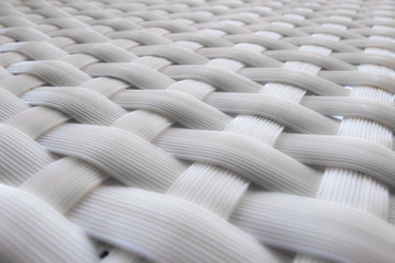Obraz premium still life: detail of white woven seat, abstract background