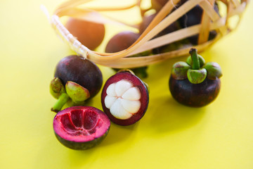 Mangosteen peeled summer fruit on yellow background - Fresh mangosteen from garden Thailand , Queen of fruit healthy