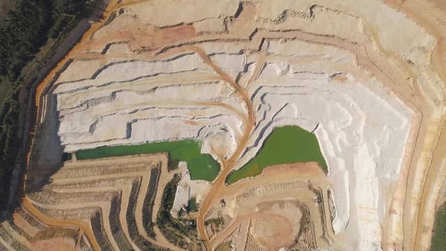 TURNOV, CZECH REPUBLIC - JUNE, 2019: Aerial drone view of a chalkpit near Turnov city.