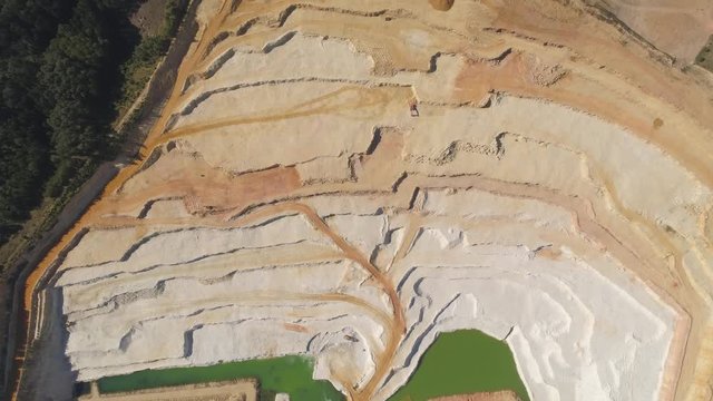 TURNOV, CZECH REPUBLIC - JUNE, 2019: Aerial drone view of a chalkpit near Turnov city.