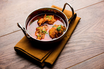 Lauki Kofta Curry made using Bottel Gourd or Doodhi, served in a bowl or karahi. selective focus