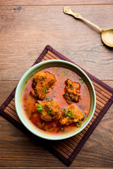 Lauki Kofta Curry made using Bottel Gourd or Doodhi, served in a bowl or karahi. selective focus