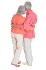 Perfect old couple posing on a white background, back view
