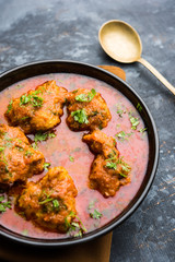 Lauki Kofta Curry made using Bottel Gourd or Doodhi, served in a bowl or karahi. selective focus