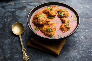 Lauki Kofta Curry made using Bottel Gourd or Doodhi, served in a bowl or karahi. selective focus