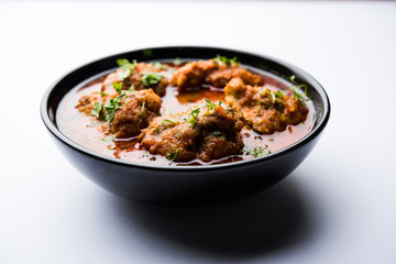 Lauki Kofta Curry made using Bottel Gourd or Doodhi, served in a bowl or karahi. selective focus